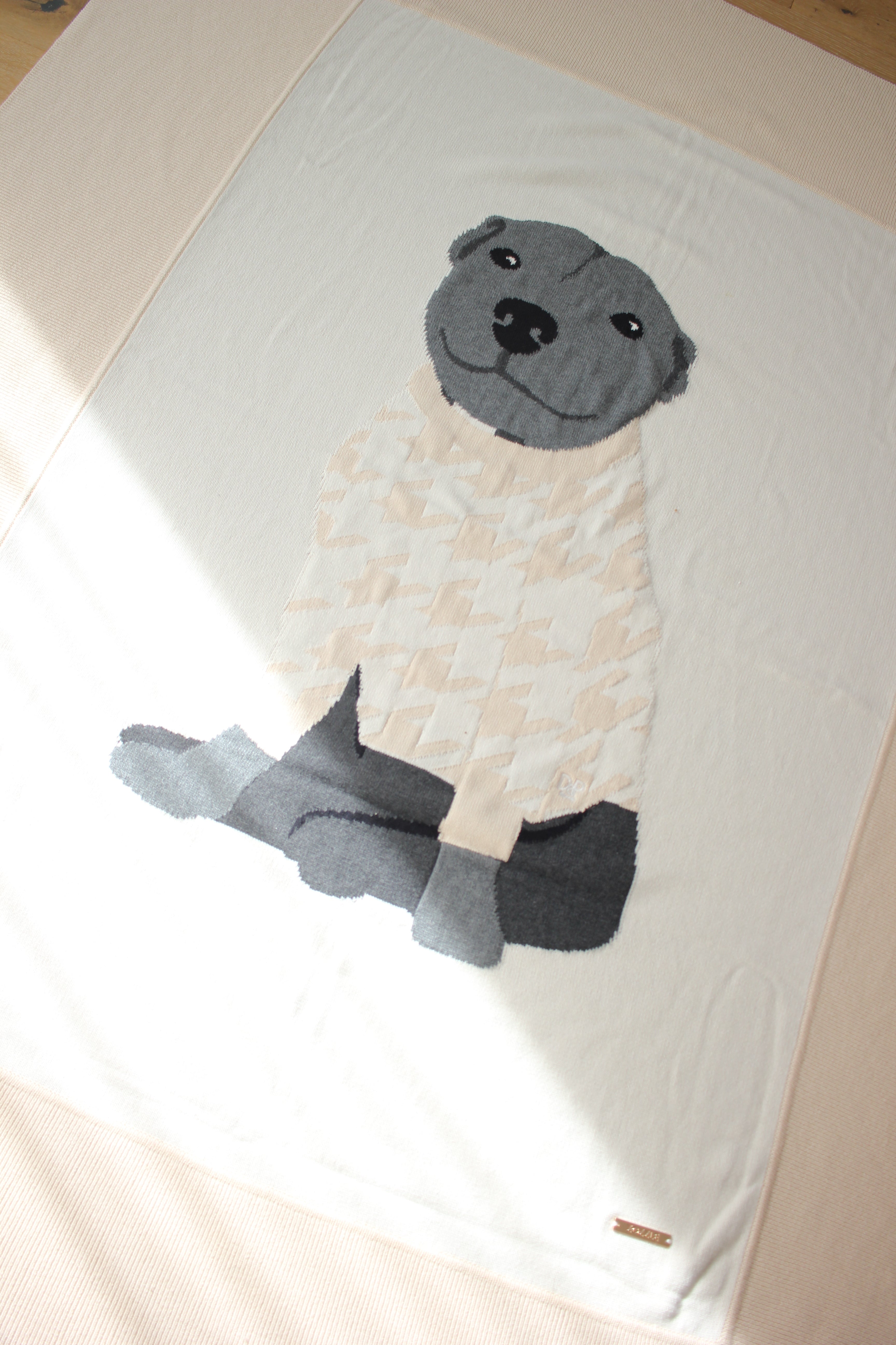 The "Zozzle" knitted blanket.