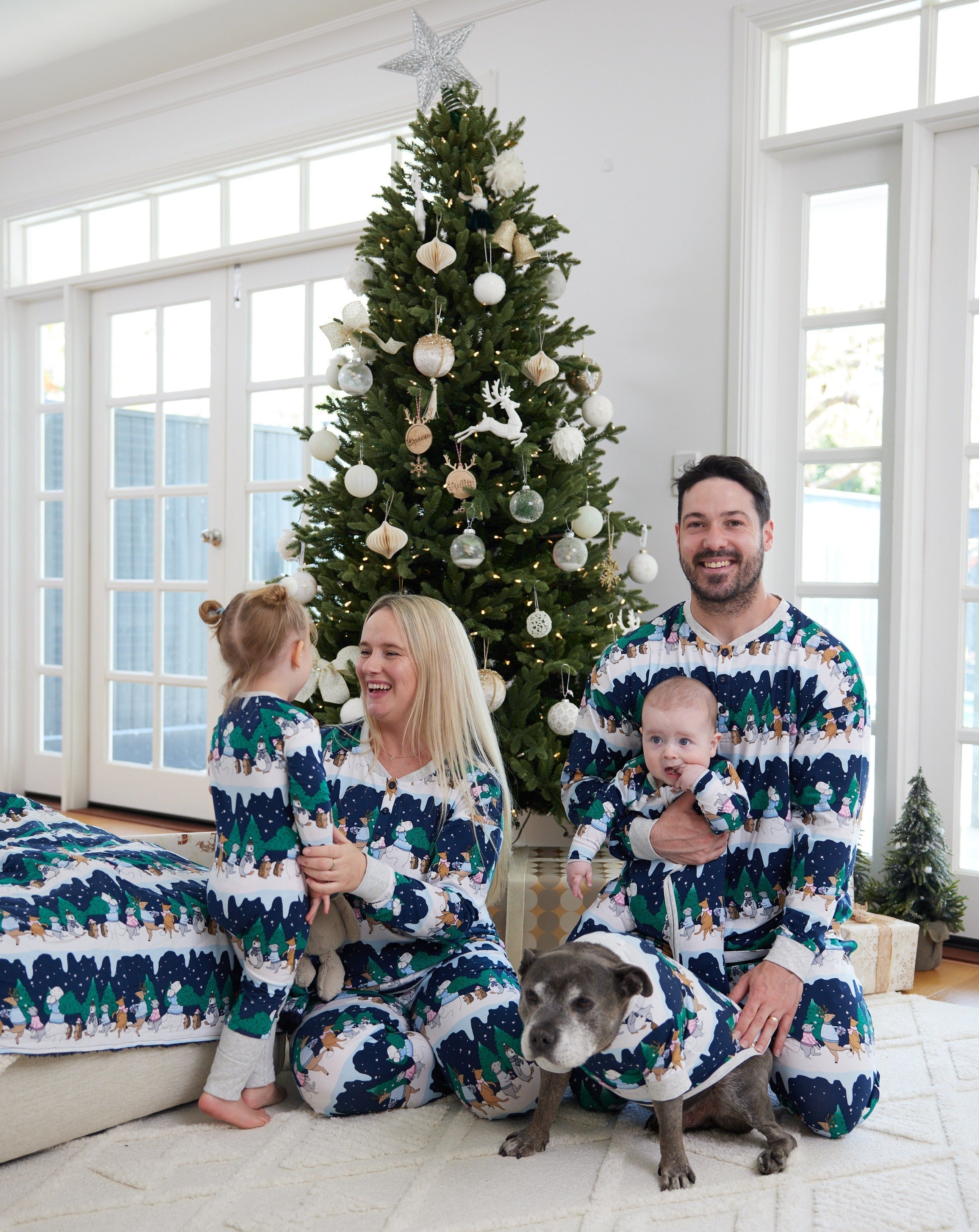 Darren and Phillip matching Christmas family pyjamas.