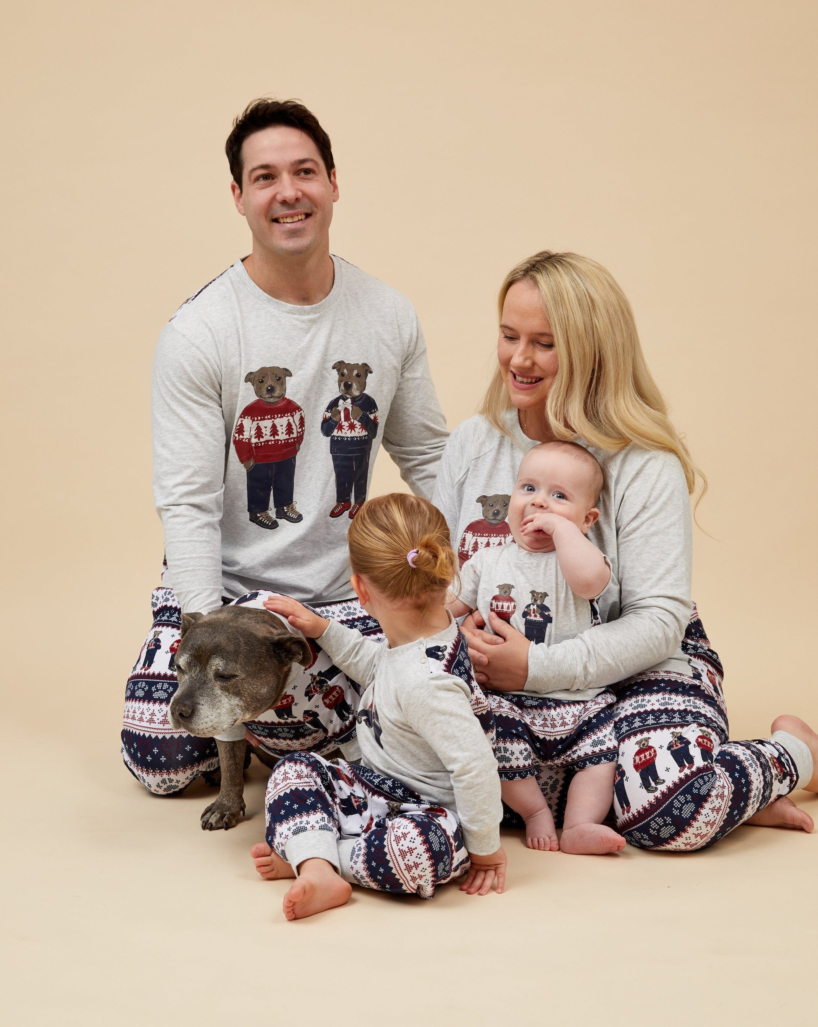 Darren and Phillip matching Christmas family pyjamas.